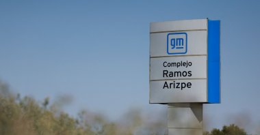 A view of the GM logo on a sign board at the Ramos Arizpe plant of General Motors, which exports vehicles to the U.S. and Canada, Ramos Arizpe, Coahuila state, Mexico, Nov. 2, 2024. (Reuters Photo)