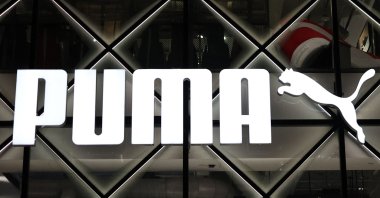The logo of German sportswear and footwear brand Puma is seen in New York, Nov. 19, 2024. (AFP Photo)