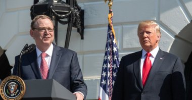 Kevin Hassett, Chair of the Council of Economic Advisers, speaks about the economy as then-U.S. President Donald Trump (C) looks on at the White House in Washington, D.C., July 27, 2018. (AFP File Photo)