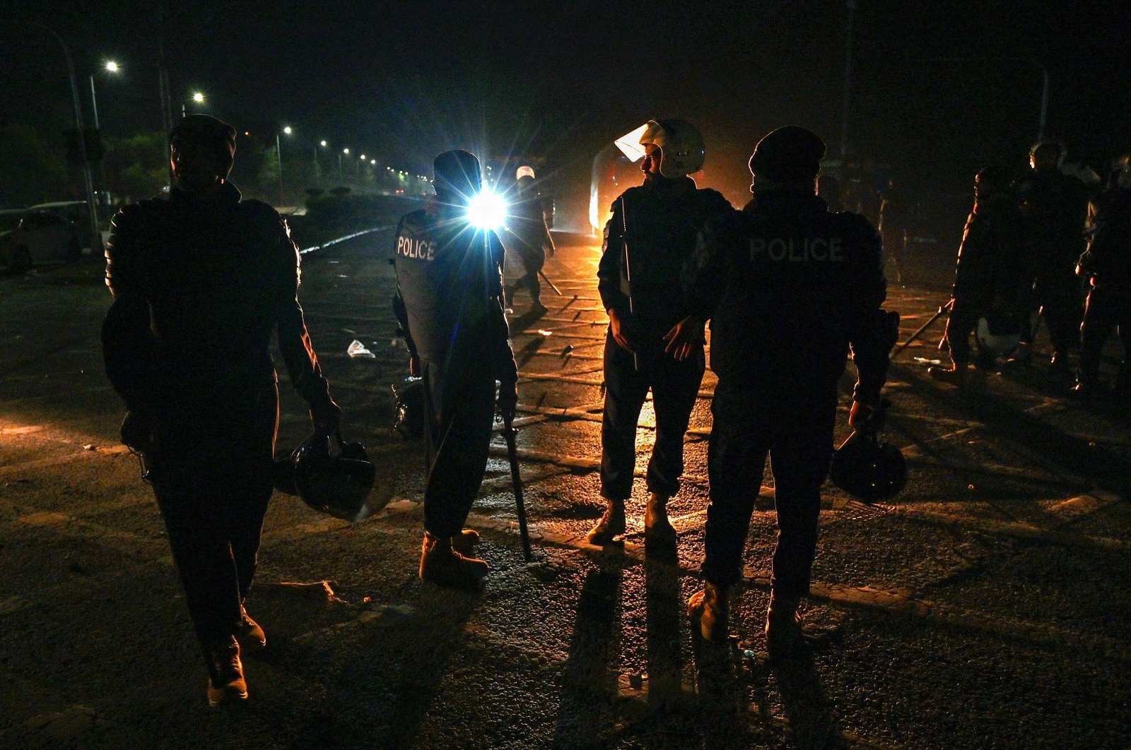 Policemen stand guard at the Red Zone area after an overnight operation against the supporters of jailed ex-PM Imran Khan, Islamabad, Pakistan, Nov. 27, 2024. (AFP Photo)