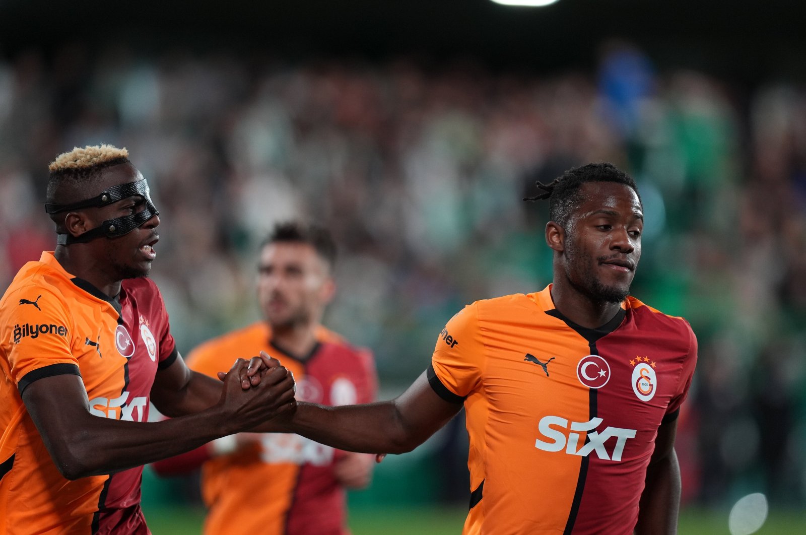 Galatasaray&#039;s Michy Batshuayi (R) and Victor Osimhen celebrate after a goal during the Süper Lig match against Bodrum FK at the Grey Beton Bodrum Stadium, Bodrum, Türkiye, Nov. 23, 2024. (AA Photo)