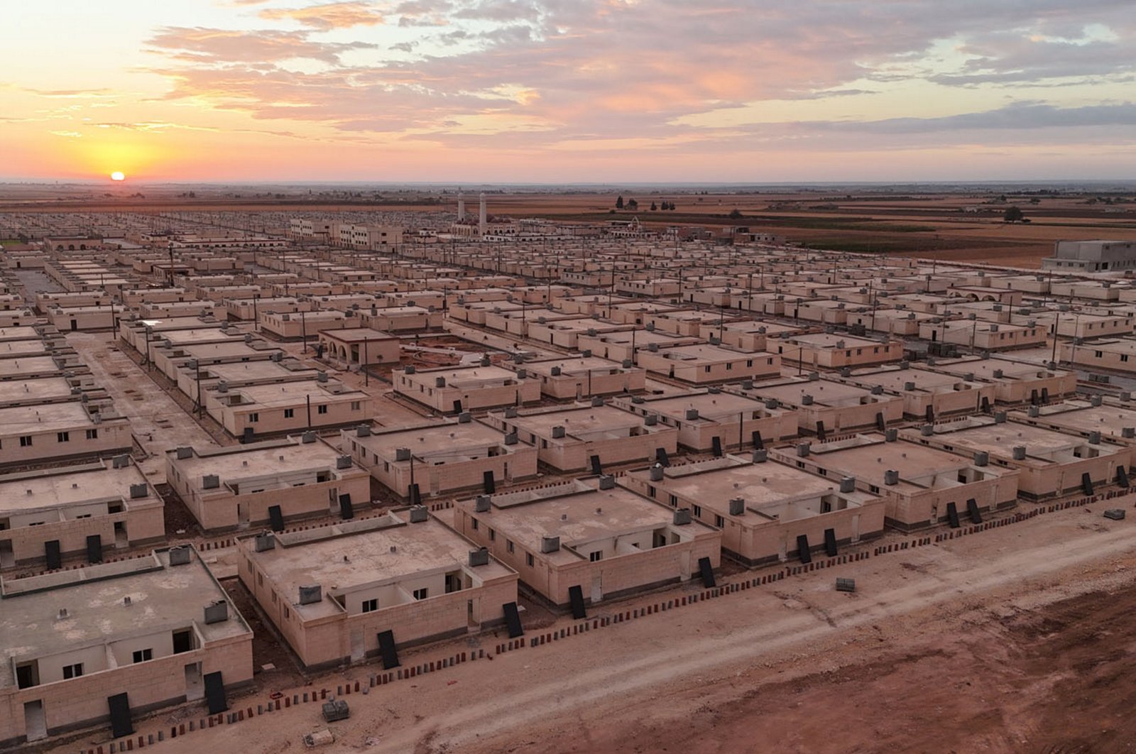 An aerial view shows the buildings established as part of the &quot;Hope City&quot; project, Tukli village near Azaz, northern Syria, Nov. 27, 2024. (AA Photo)