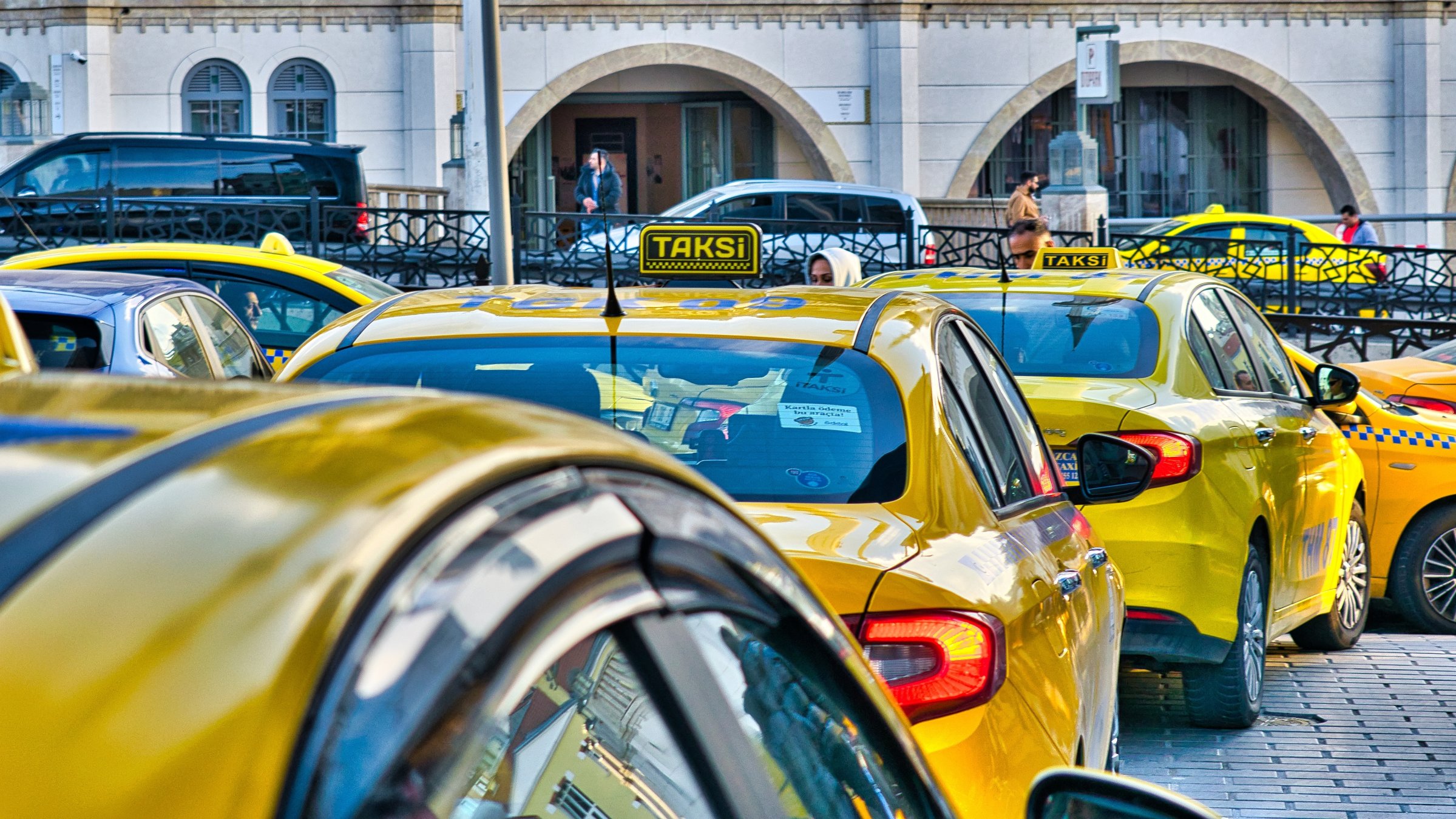 Iconic yellow taxis line up, waiting for passengers in Istanbul, Türkiye, Jan. 15, 2024. (Shutterstock Photo)