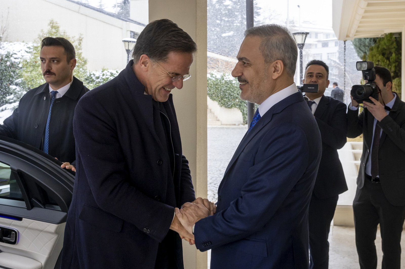 Foreign Minister Hakan Fidan (R) welcoming NATO Secretary General Mark Rutte (L) before their meeting in Ankara, Türkiye, Nov. 25, 2024. (NATO Press Office Handout via EPA Photo)