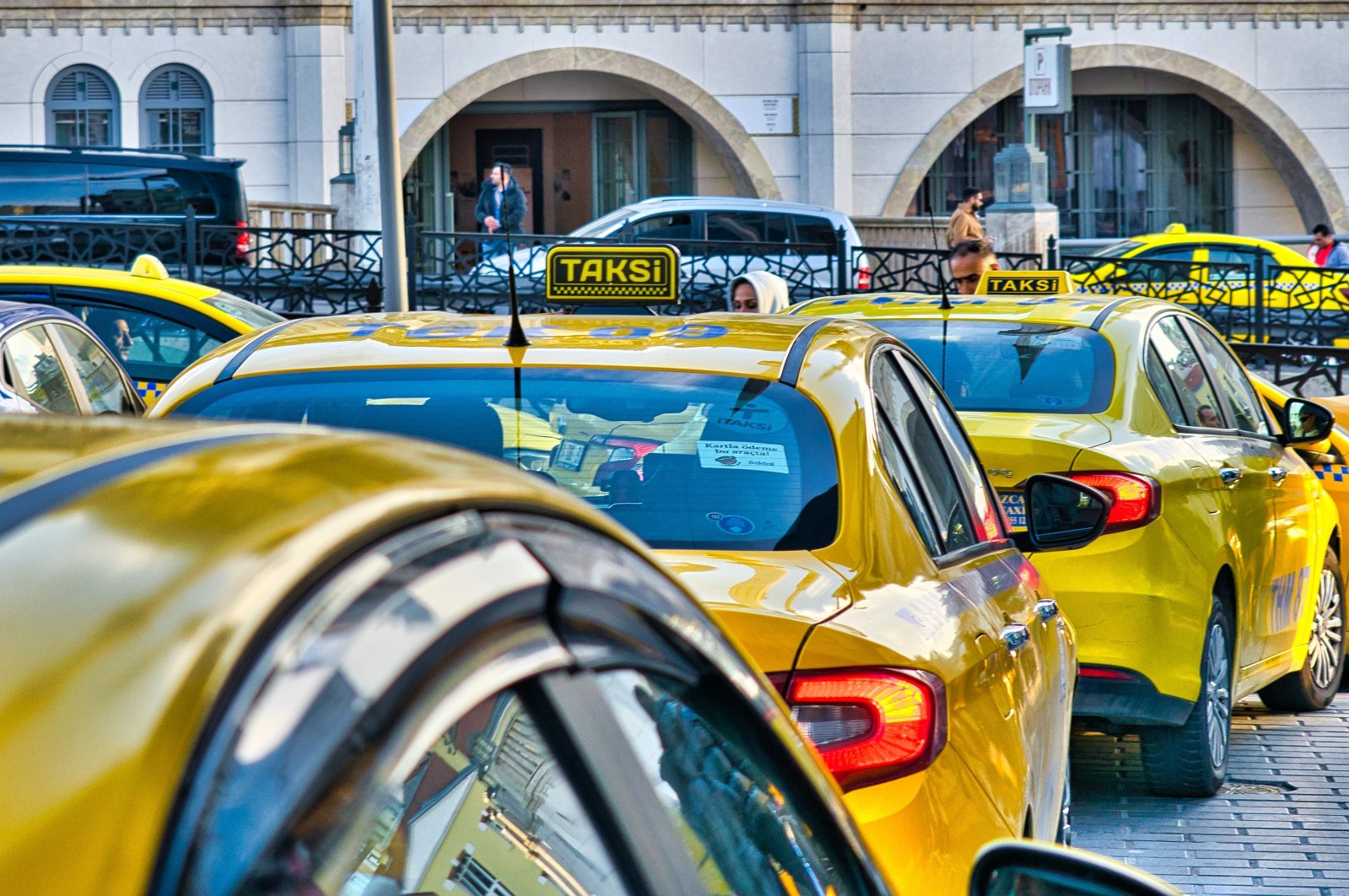 Iconic yellow taxis line up, waiting for passengers in Istanbul, Türkiye, Jan. 15, 2024. (Shutterstock Photo)