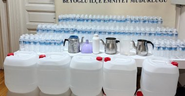 In a photo provided by the Istanbul Police Department, bootleg alcohol confiscated during operations is displayed at a police station in Istanbul, Türkiye, Nov. 28, 2024. (AA Photo)