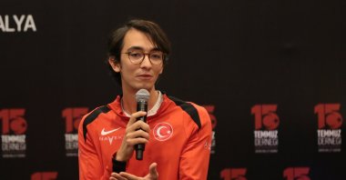 Mete Gazoz speaks with the youth at the "8th Traditional Martyrs&#039; Families Meeting" organized by the 15 July Association, Antalya, Türkiye, Nov. 28, 2024. (AA Photo)