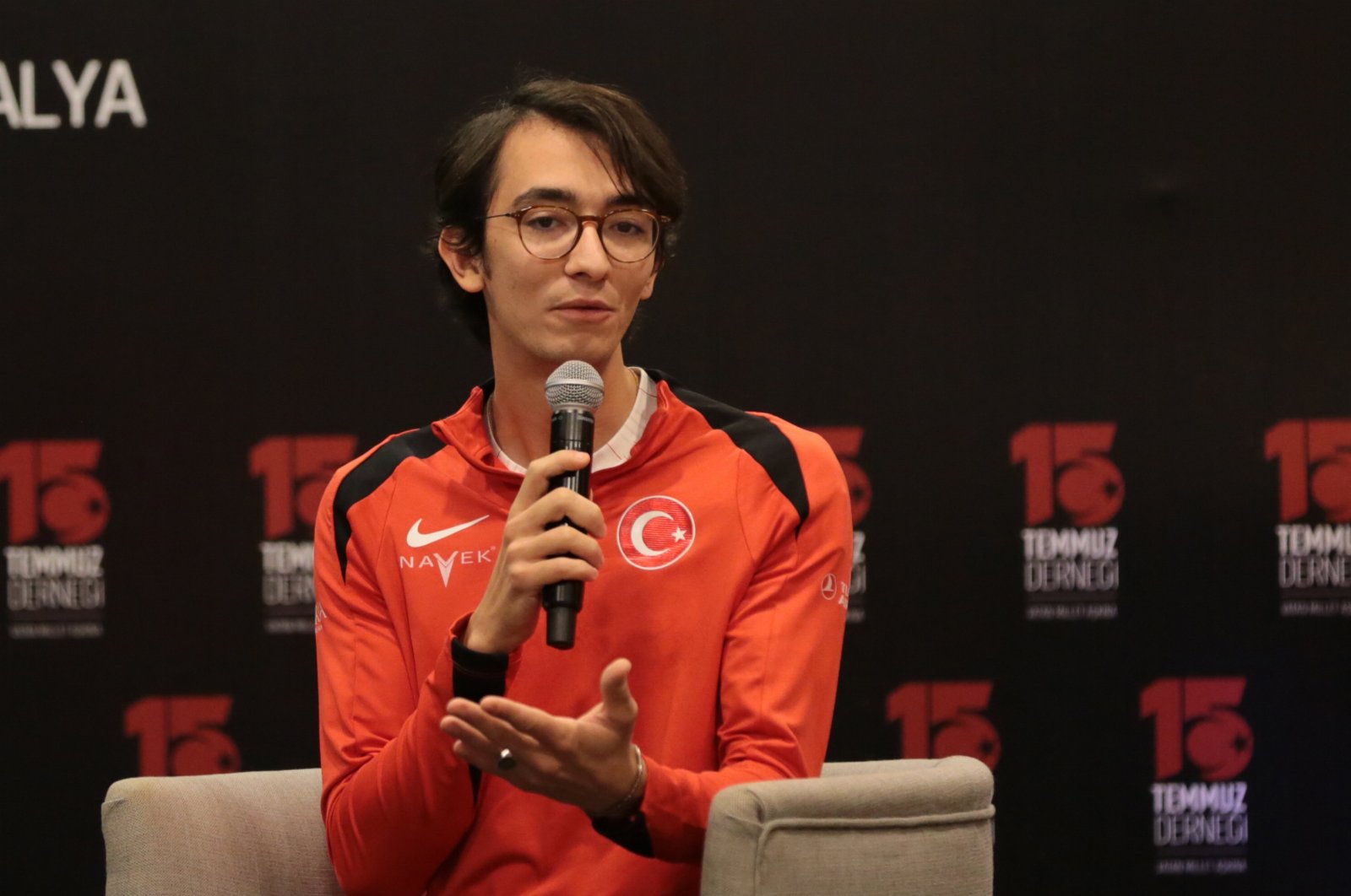 Mete Gazoz speaks with the youth at the "8th Traditional Martyrs&#039; Families Meeting" organized by the 15 July Association, Antalya, Türkiye, Nov. 28, 2024. (AA Photo)