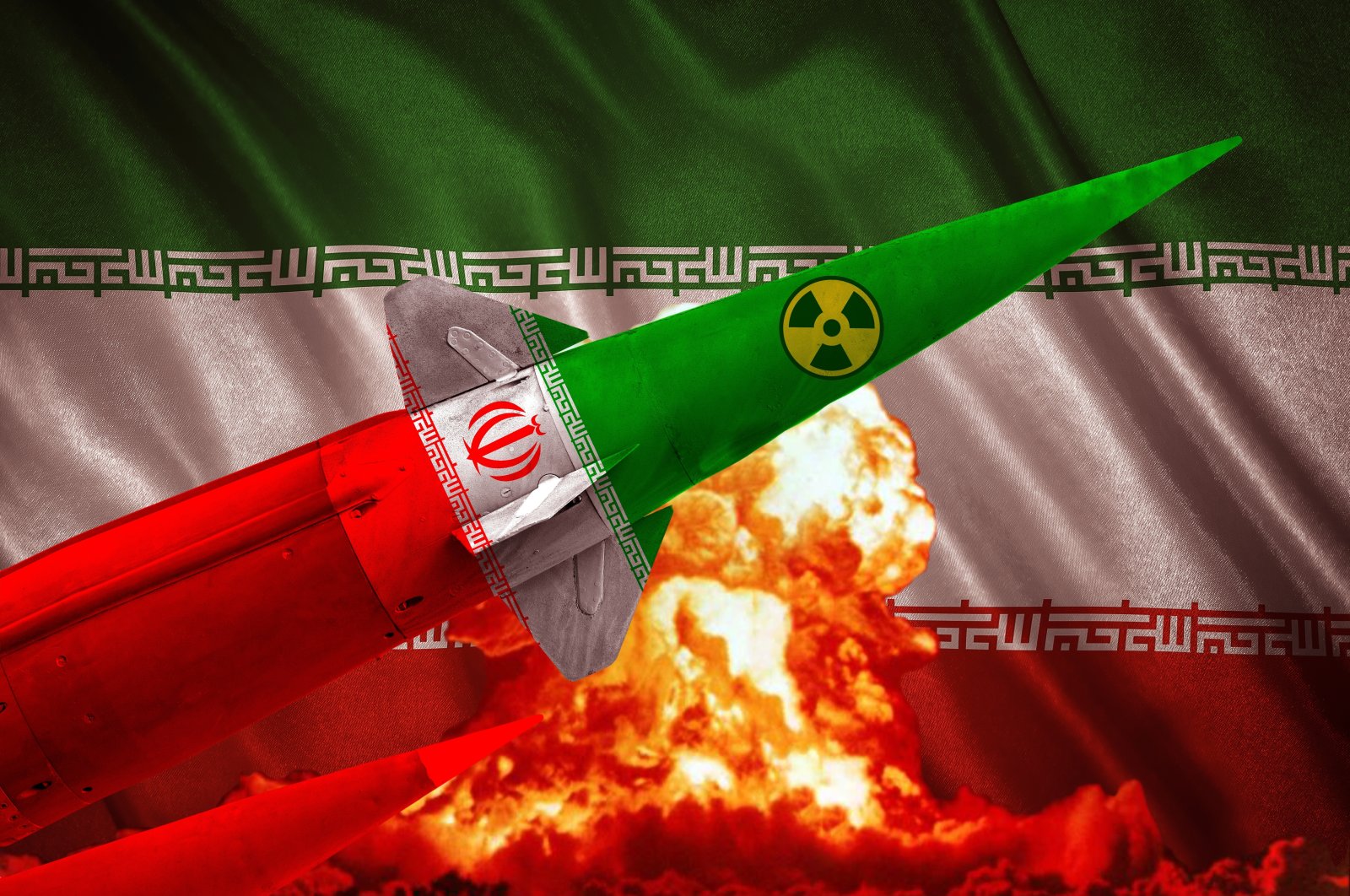 A nuclear missile with Iran&#039;s flag and symbol flies against a backdrop of an explosion, representing the nuclear threat, geopolitical tensions and Iran&#039;s missile program. (Shutterstock Photo)