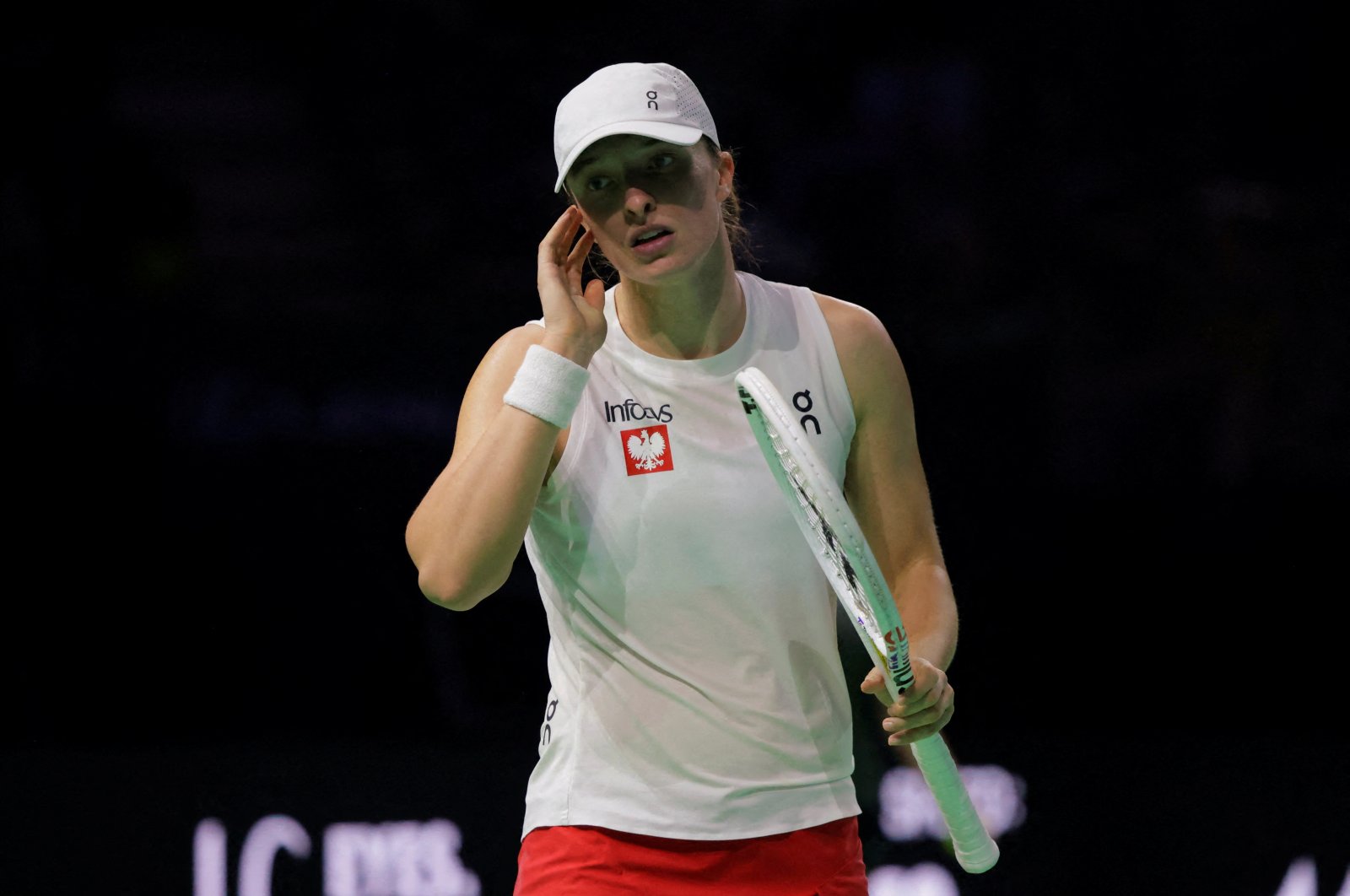 Poland&#039;s Iga Swiatek reacts during her Billie Jean King Cup Finals semifinal match against Italy&#039;s Jasmine Paolini at the Palacio de Deportes Jose Maria Martin Carpena Arena, Malaga, Spain, Nov. 18, 2024. (Reuters Photo)