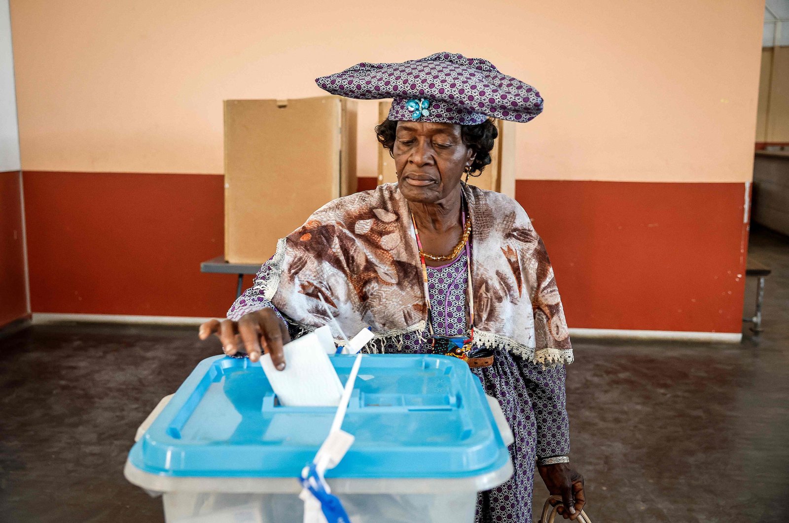 A woman casts her vote at a polling station during extended voting following the country&#039;s general election, Windhoek, Namibia, Nov. 29, 2024. (AFP Photo)