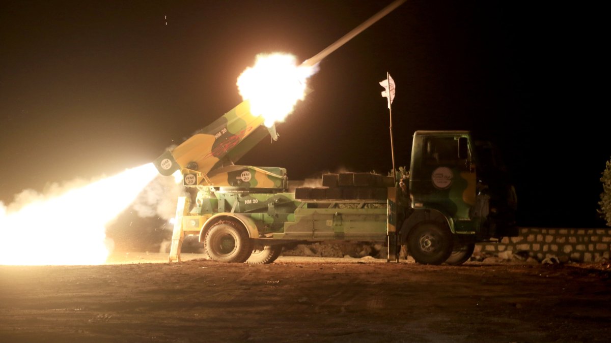 Syrian opposition forces fire rockets toward PKK/YPG positions near al-Bab, Syria, Nov. 25, 2024. (AA Photo)