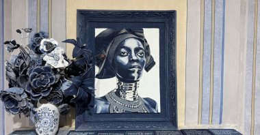 A piece by Ian Berry is featured in his &quot;Beyond Denim&quot; exhibition, hosted by Kalyon Kültür in Nişantaşı, Istanbul, Türkiye, Nov. 29, 2024. (AA Photo)