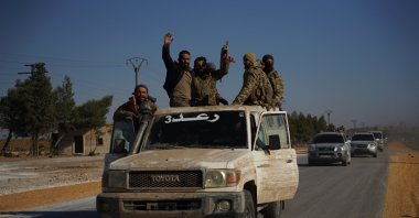 Syrian National Army (SNA) members advance toward Tal Rifaat, Syria, Dec. 1, 2024. (AA Photo)