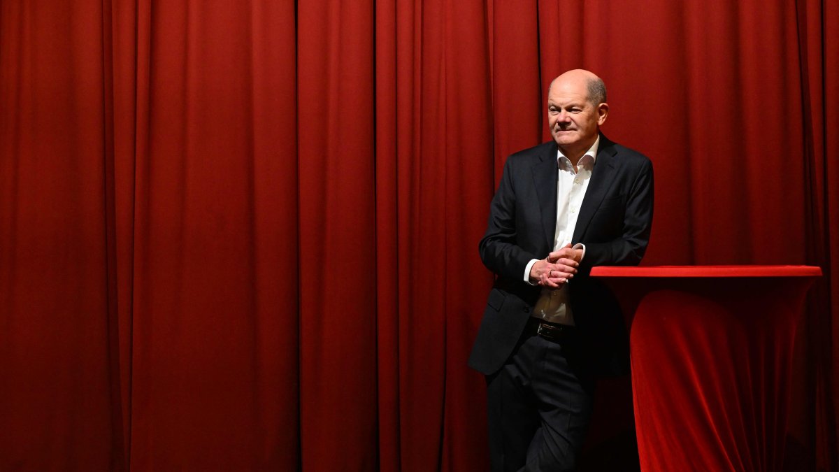 German Chancellor Olaf Scholz talks on stage during a meeting in Kleinmachnow, eastern Germany, Nov. 30, 2024. (AFP Photo)