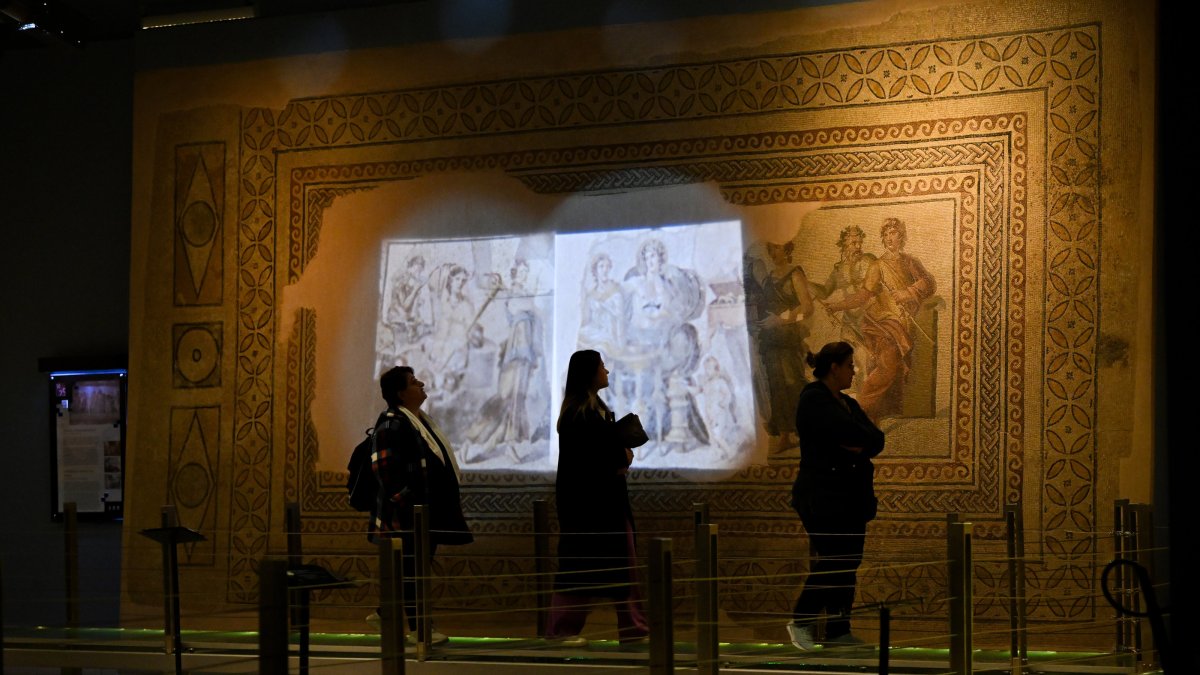 Visitors explore the ancient and unique pieces at Zeugma Mosaic Museum in Gaziantep, Türkiye, Nov. 27, 2024. (DHA Photo)