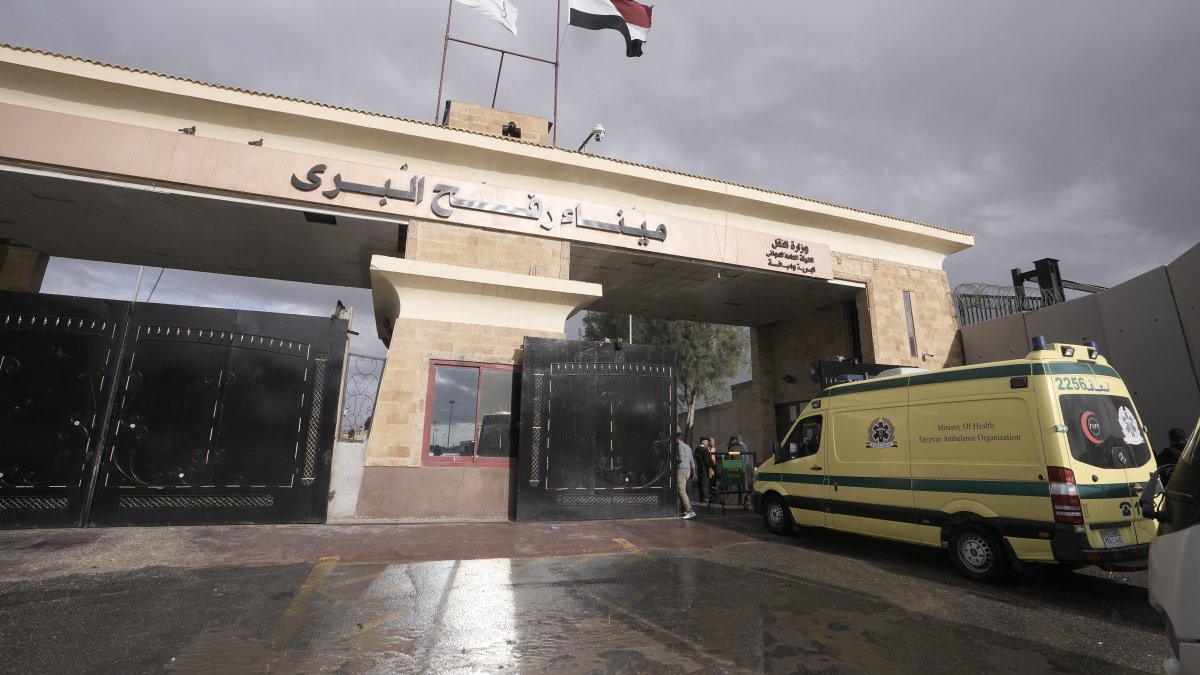 An Egyptian ambulance travels toward Gaza through the Rafah crossing port, Egypt, Nov.27, 2023. (AP Photo)