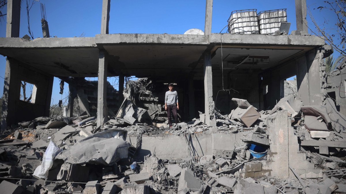 A Palestinian boy inspects the destruction at the site of an Israeli strike that targeted a house in the Bureij refugee camp in the central Gaza Strip, Dec. 2, 2024. (AFP Photo)