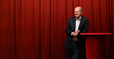 German Chancellor Olaf Scholz talks on stage during a meeting in Kleinmachnow, eastern Germany, Nov. 30, 2024. (AFP Photo)