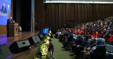 President Recep Tayyip Erdoğan (L) speaks at an event to mark the International Day of Persons with Disabilities in the capital, Ankara, Türkiye, Dec. 2, 2024. (AA Photo)