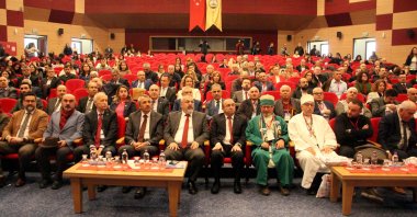 Alevi-Bektashi community members and presidency Chair Alirıza Özdemir (Front 5th L) attend an event in Edirne, northwestern Türkiye, Nov. 28, 2024. (DHA Photo)