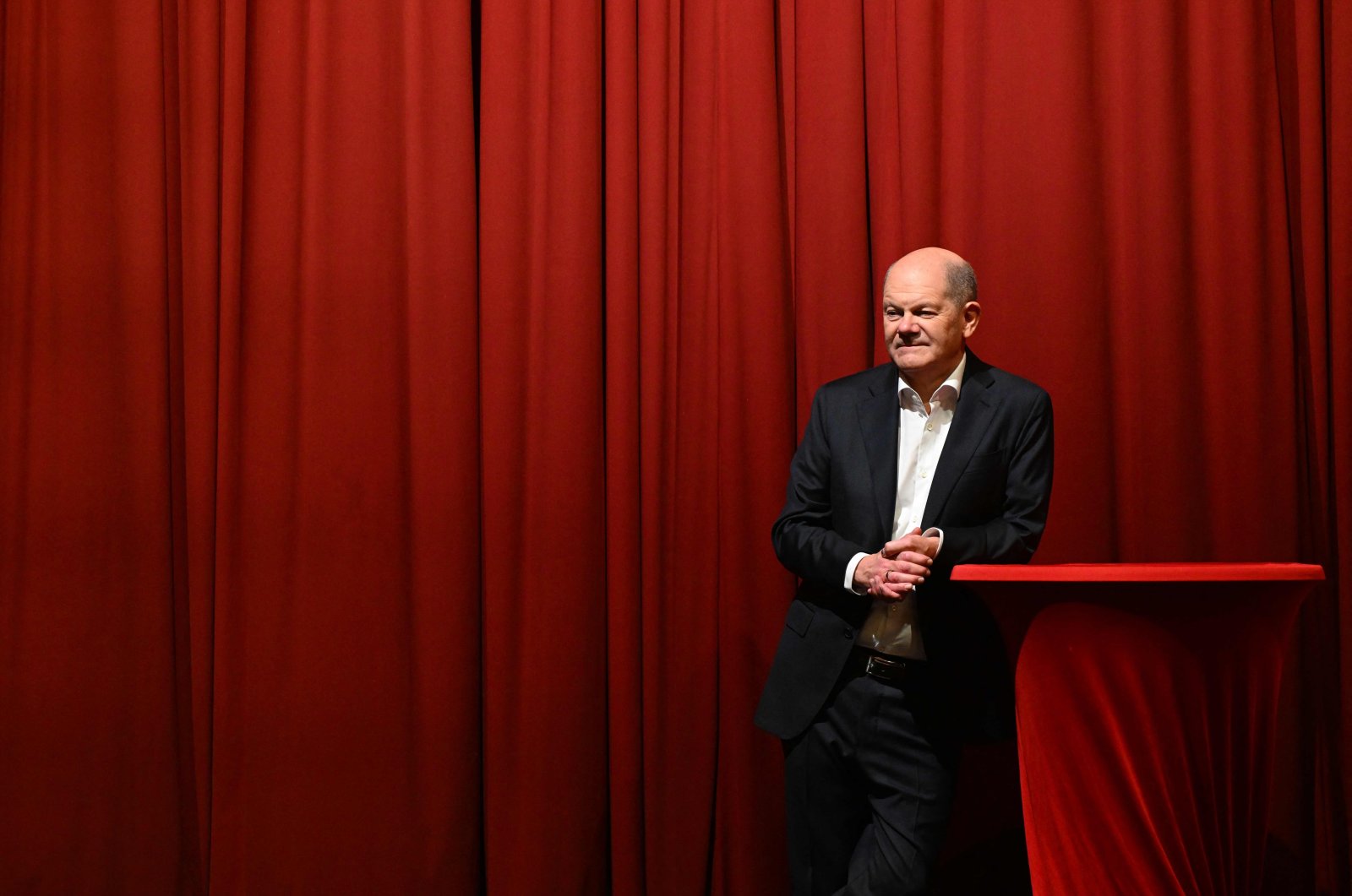 German Chancellor Olaf Scholz talks on stage during a meeting in Kleinmachnow, eastern Germany, Nov. 30, 2024. (AFP Photo)