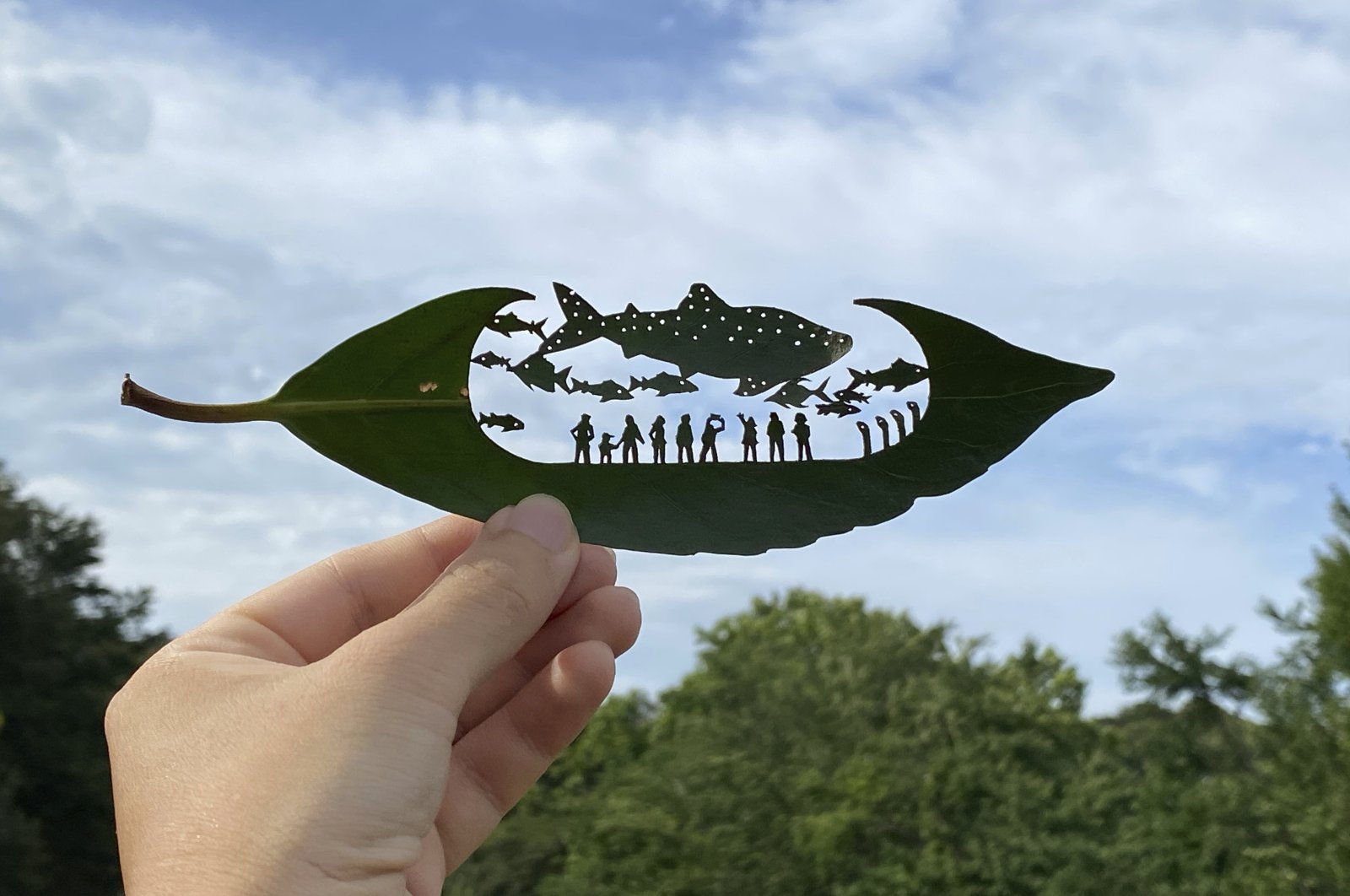 This undated photo provided by Japanese leaf-cutting artist, who goes by the name Lito, shows his work titled: &quot;Leaf Aquarium.&quot; (AP Photo)