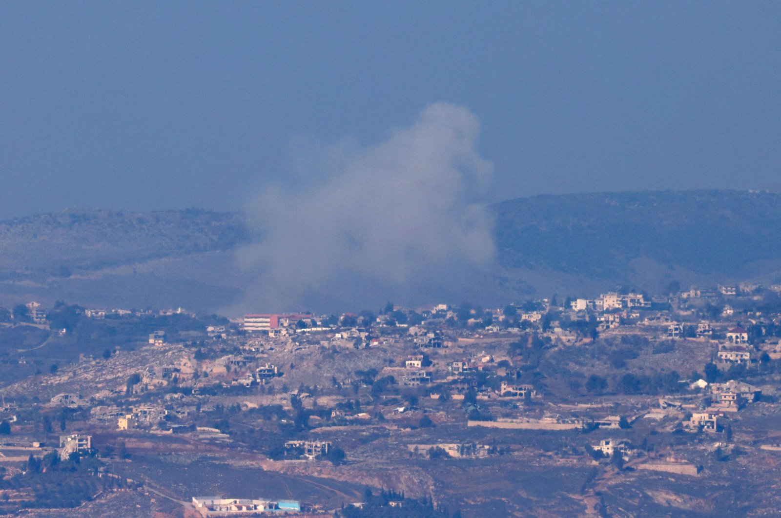 Smoke billows above the Khiam during Israeli bombardment in southern Lebanon, Dec. 2, 2024. (AFP Photo)