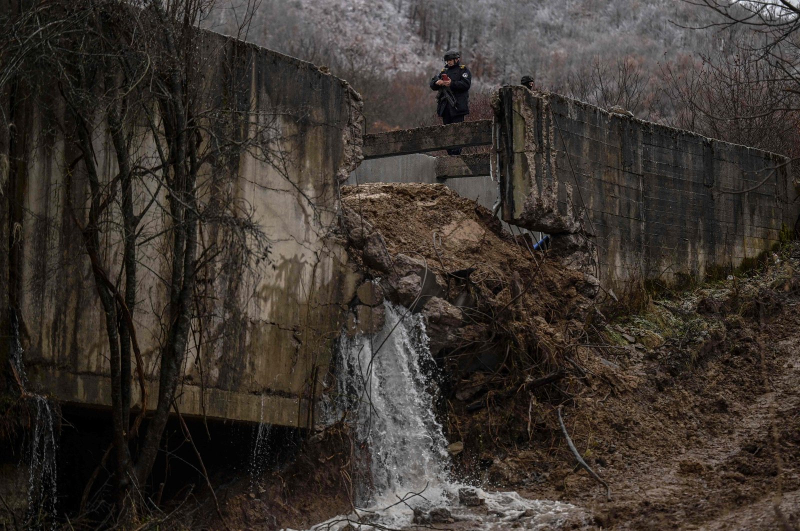 Kosovo Police special unit secures the area near the site of an explosion in the village of Varage, Kosovo, Nov. 30, 2024. (AFP Photo)