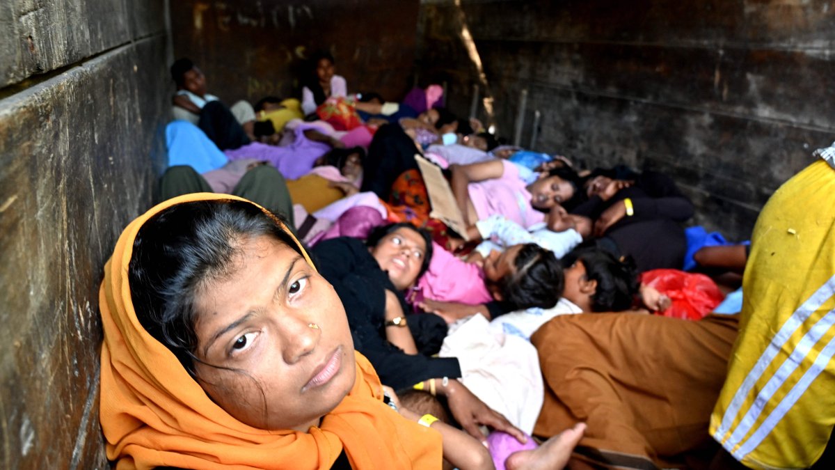  Rohingya refugees sit on a truck after being relocated from Southern Aceh province to Banda Aceh, Nov. 7, 2024. (AFP Photo)