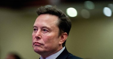 Tesla CEO and X owner Elon Musk listens as U.S. President-elect Donald Trump speaks during a meeting with House Republicans at the Hyatt Regency hotel in Washington, U.S., Nov. 13, 2024. (Reuters Photo)