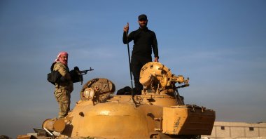 Armed men take position in Aleppo after rebel forces took control of the city, in Aleppo, Syria, Dec. 02, 2024. (EPA Photo)
