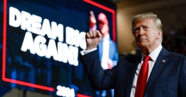 Donald Trump gestures during a campaign rally. 