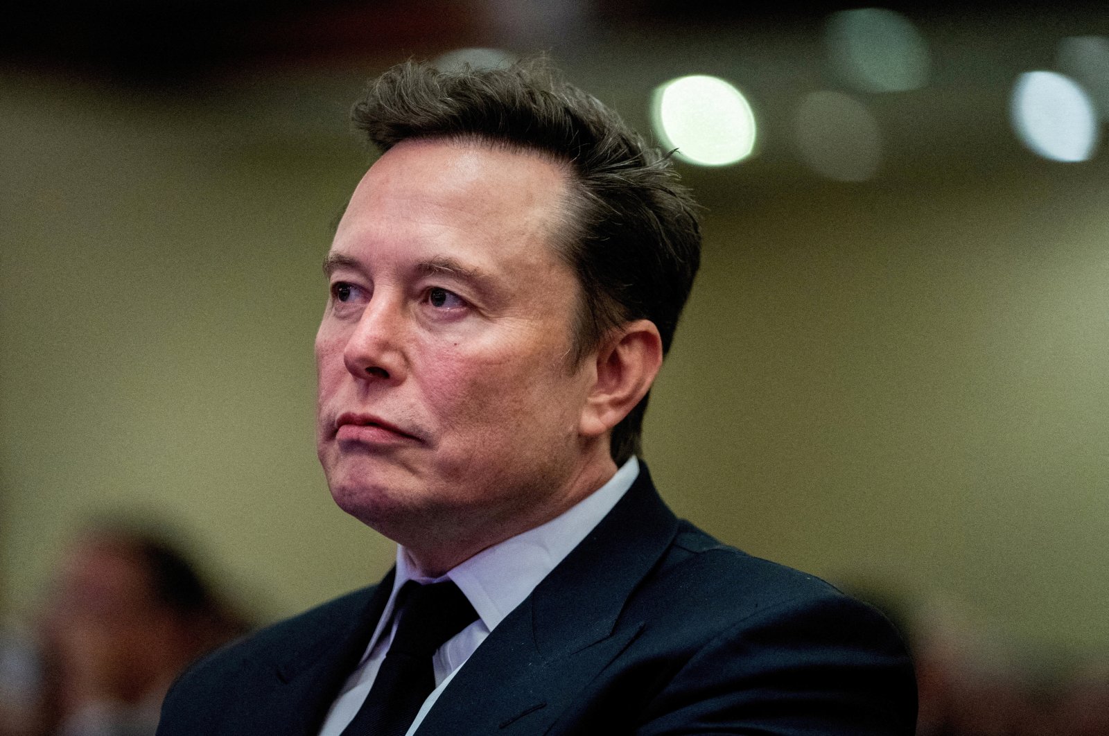 Tesla CEO and X owner Elon Musk listens as U.S. President-elect Donald Trump speaks during a meeting with House Republicans at the Hyatt Regency hotel in Washington, U.S., Nov. 13, 2024. (Reuters Photo)