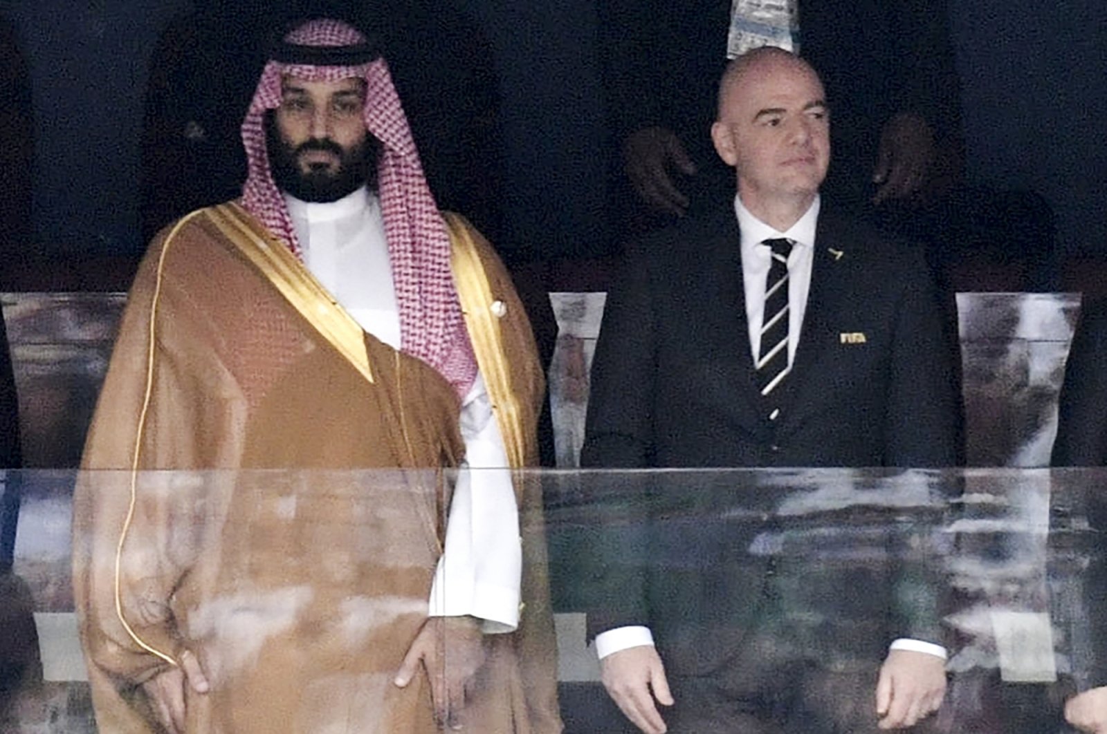 Saudi Arabia Crown Prince Mohammed bin Salman (L) and FIFA President Gianni Infantino, stand for the anthem prior to the match between Russia and Saudi Arabia which opened the 2018 World Cup at the Luzhniki stadium, Moscow, Russia, June 14, 2018. (AP Photo)