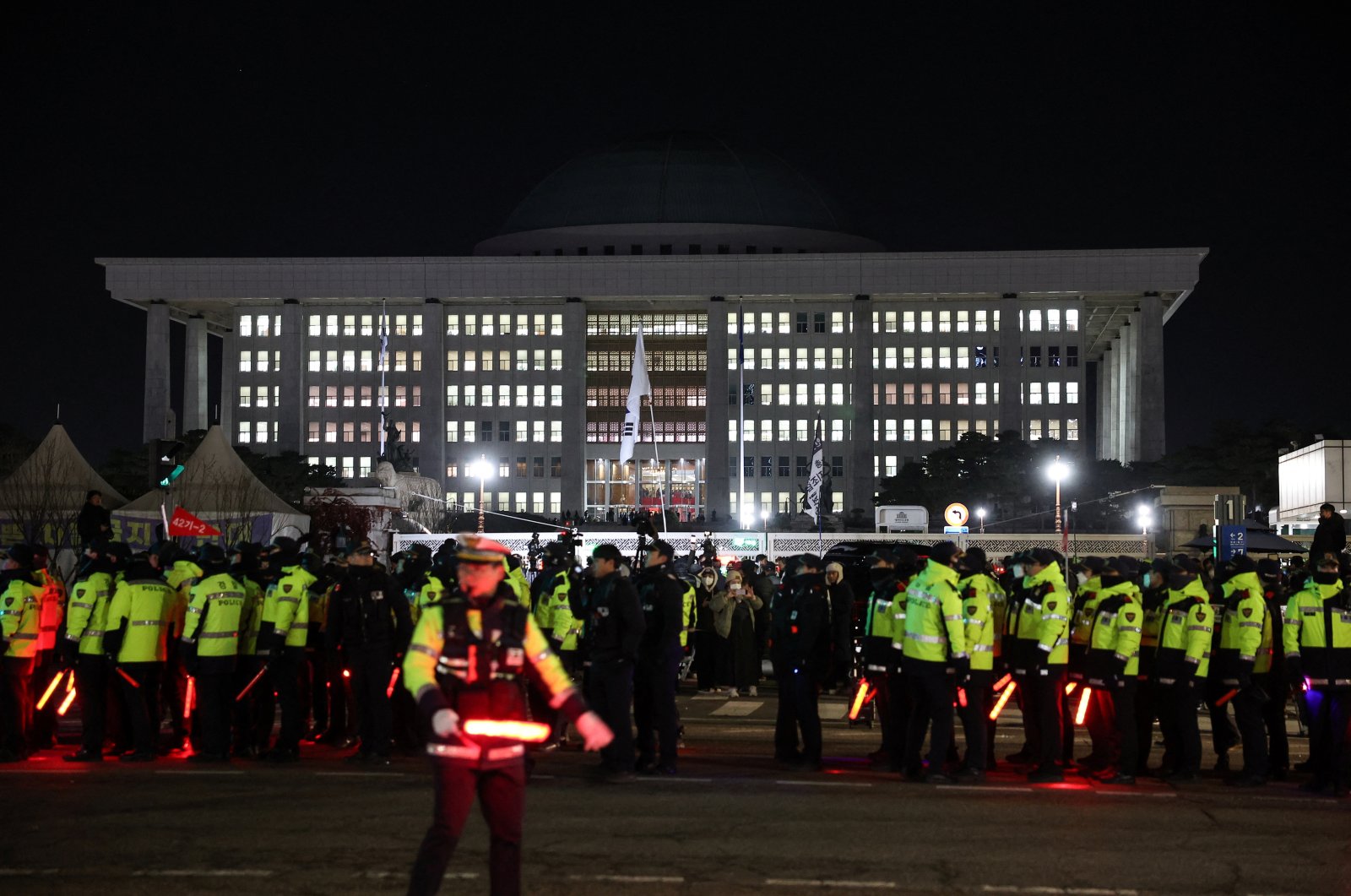 Police officers gather outside the National Assembly, after South Korean President Yoon Suk Yeol declared martial law, in Seoul, South Korea, Dec. 4, 2024. (Reuters Photo)