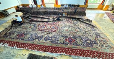 The Ottoman-era carpet to be sent to the Peace Palace in The Hague is restored in Aksaray, central Türkiye, Aug. 5, 2024. (AA Photo)