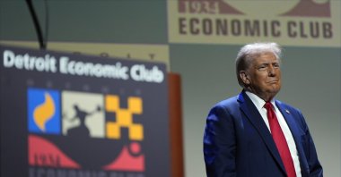Republican presidential nominee former President Donald Trump arrives to speak at a meeting of the Detroit Economic Club, Detroit, U.S., Oct. 10, 2024. (AP Photo)
