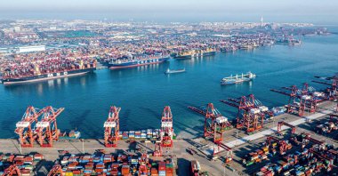 Shipping containers and gantry cranes are seen at Qingdao port in Qingdao, in eastern China's Shandong province, Dec. 4, 2024. (AFP Photo)