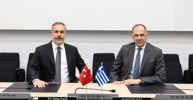 Foreign Minister Hakan Fidan and his Greek counterpart Giorgos Gerapetritis meet on the sidelines of a NATO meeting, Brussels, Belgium, Dec. 4, 2024. (AA Photo)