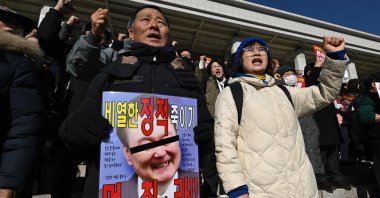 Members of South Korea&#039;s main opposition protests against President Yoon Suk Yeol in Seoul, South Korea, Dec. 4, 2024. (AFP Photo)