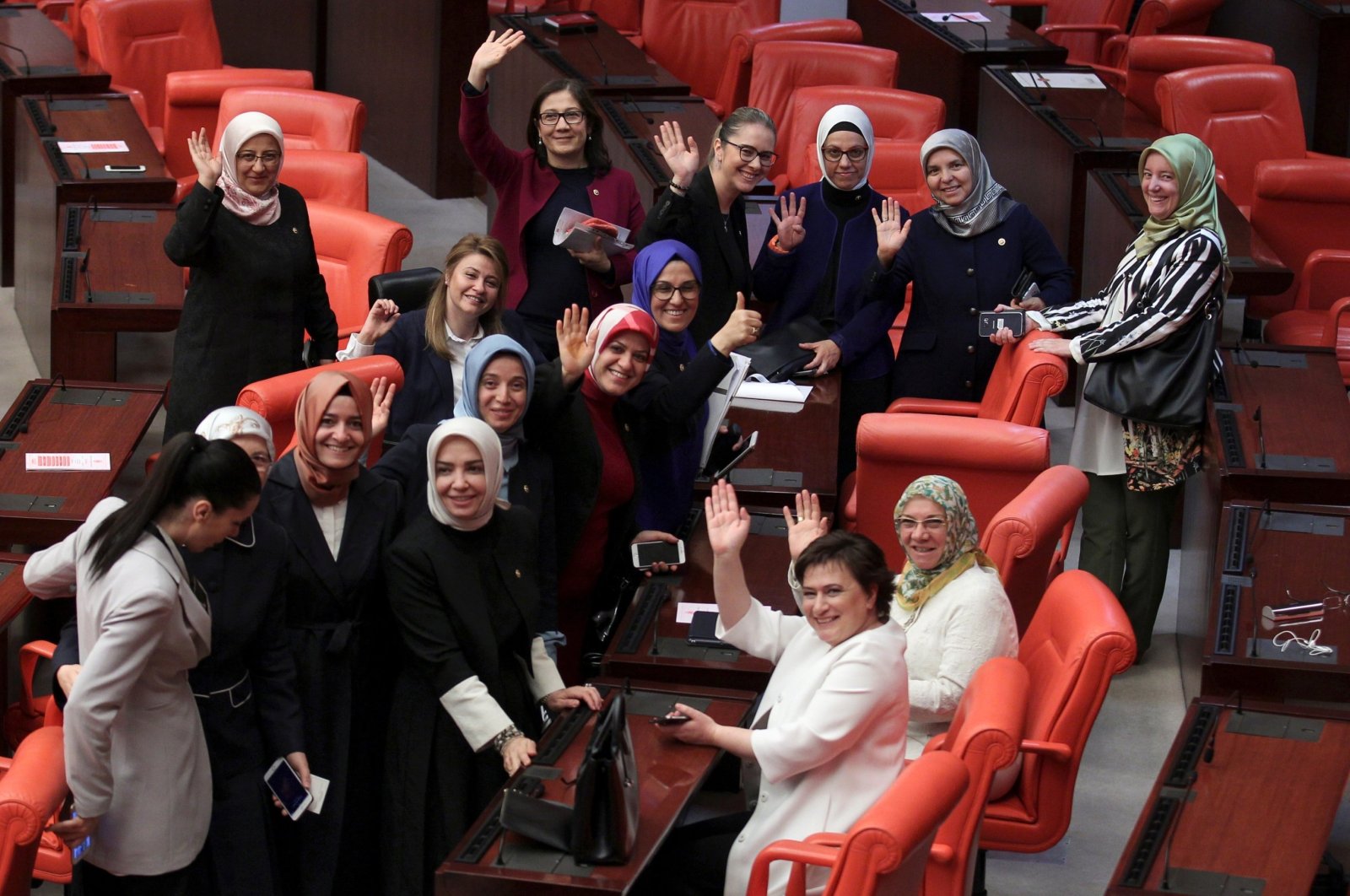 Female members of Parliament from the Justice and Development Party (AK Party) pose after a debate at the assembly, in the capital Ankara, Türkiye, May 20, 2016. (Reuters Photo)