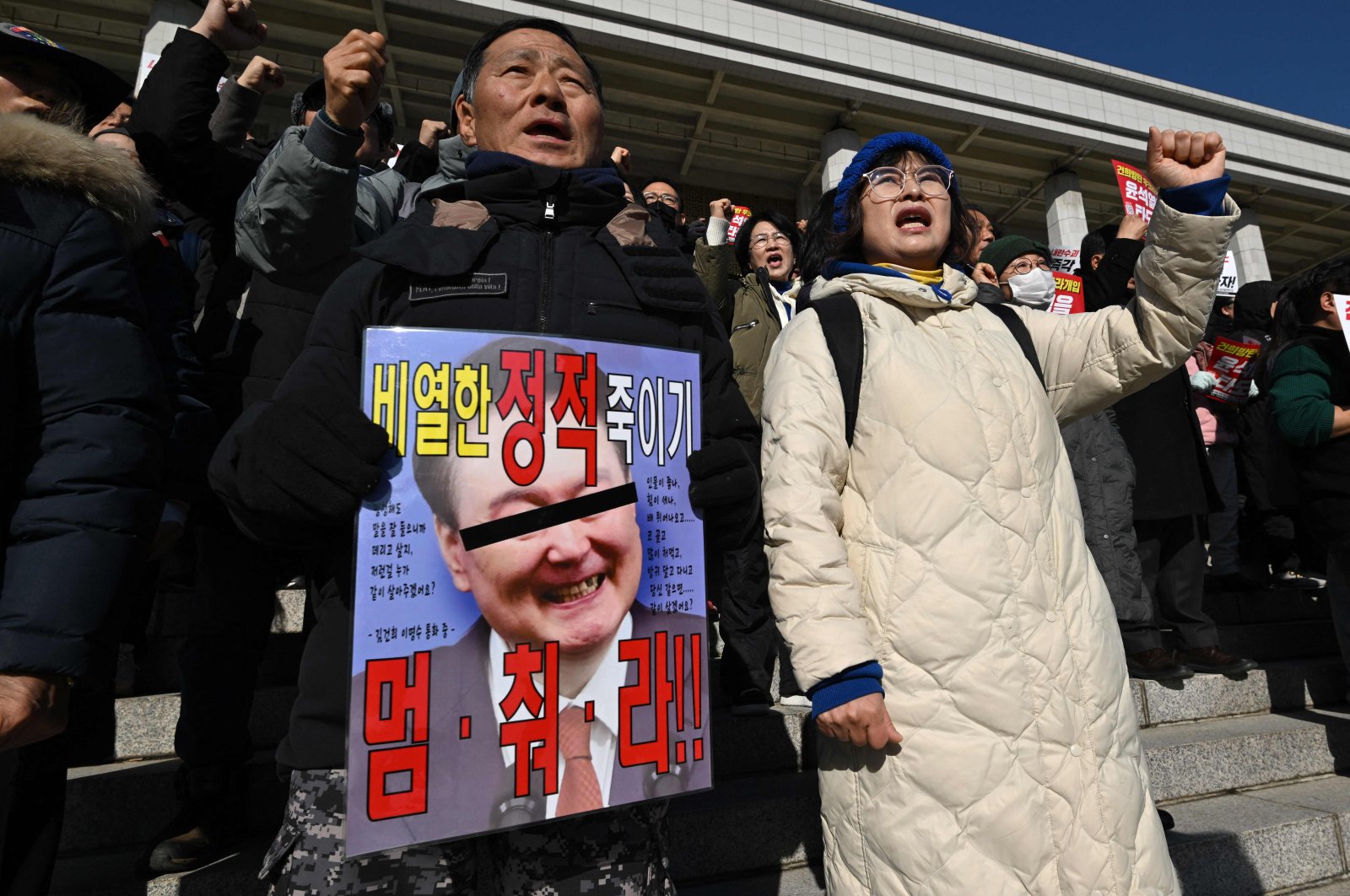 Members of South Korea&#039;s main opposition protests against President Yoon Suk Yeol in Seoul, South Korea, Dec. 4, 2024. (AFP Photo)