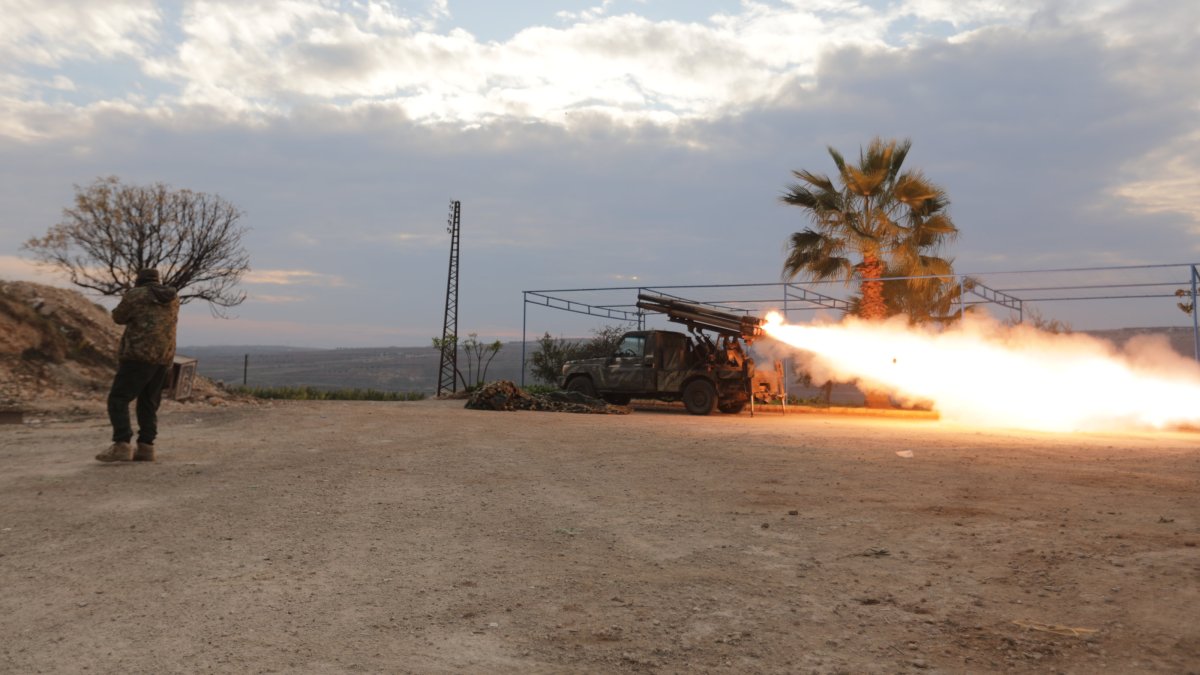 Anti-regime forces fire at regime-held positions near Hama, Syria, Dec. 4, 2024. (AA Photo)