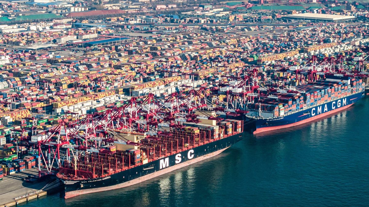 Cargo ships and containers are seen at Qingdao port in Qingdao in eastern China&#039;s Shandong province, Dec. 4, 2024. (AFP Photo)