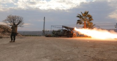 Anti-regime forces fire at regime-held positions near Hama, Syria, Dec. 4, 2024. (AA Photo)