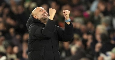 Manchester City manager Pep Guardiola reacts after Manchester City's Jeremy Doku scores his side's third goal during a Premier League match against Nottingham Forest at the Etihad Stadium, Manchester, U.K., Dec. 4, 2024. (AP Photo)