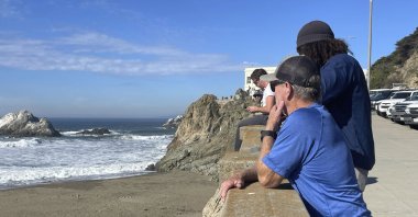 People watch the waves come in after an earthquake was felt widely across Northern California at Ocean Beach in San Francisco, U.S., Dec. 5, 2024. (AP Photo)