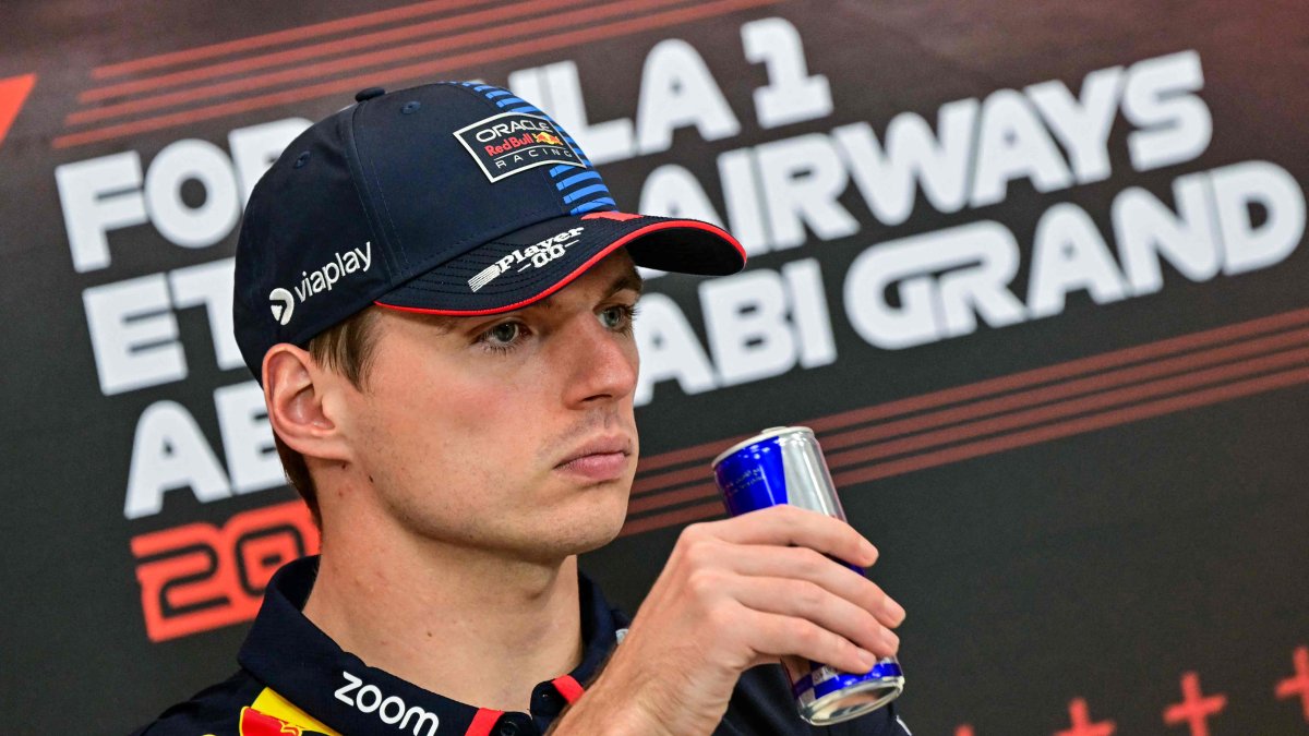 Red Bull Racing’s Dutch driver Max Verstappen drinks from a Red Bull can during a press conference ahead of the Abu Dhabi Formula One Grand Prix at the Yas Marina Circuit, Abu Dhabi, U.A.E, Dec. 5, 2024. (AFP Photo)