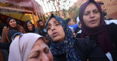 A Palestinian woman mourns her relatives, killed in an Israeli strike on the previous day, during a funeral outside the Al-Nasser Hospital, Khan Younis, Gaza Strip, Palestine, Dec. 5, 2024. (AFP Photo)
